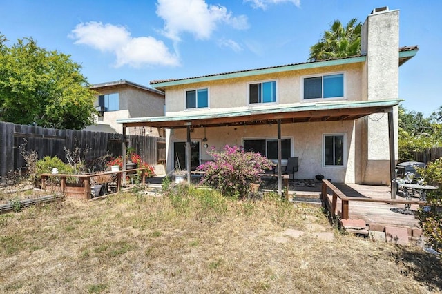 250 65th St, San Diego, CA 92114 - rear view of property featuring a fenced backyard, stucco siding, a chimney, and a patio