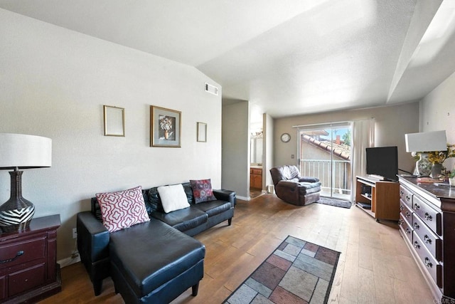 250 65th St, San Diego, CA 92114 - living area featuring hardwood / wood-style flooring and vaulted ceiling