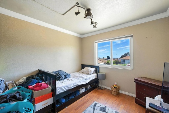 250 65th St, San Diego, CA 92114 - bedroom with wood finished floors and ornamental molding