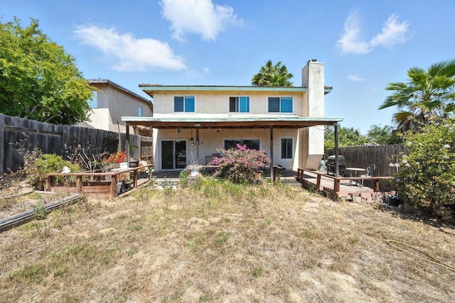 250 65th St, San Diego, CA 92114 - rear view of property featuring a chimney, a fenced backyard, and stucco siding
