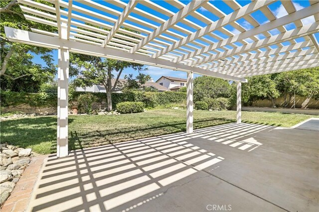 2065 N Shorewood Ave, Upland, CA 91784 - fenced backyard with a patio area and a pergola
