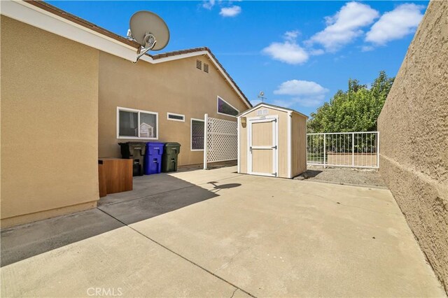 2065 N Shorewood Ave, Upland, CA 91784 - view of patio / terrace featuring a storage shed