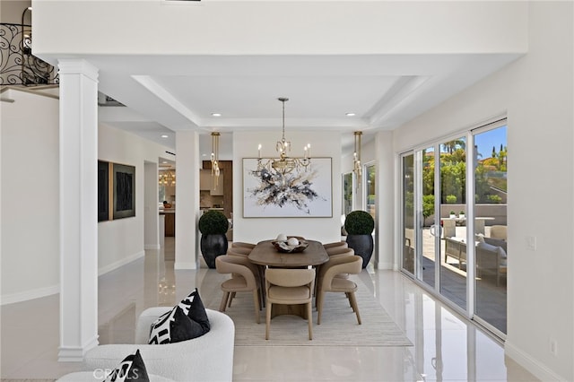 7 Sierra Vis, Laguna Niguel, CA 92677 - dining area with a tray ceiling, recessed lighting, ornate columns, a chandelier, and light tile patterned floors