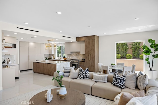 7 Sierra Vis, Laguna Niguel, CA 92677 - living room featuring recessed lighting and a chandelier