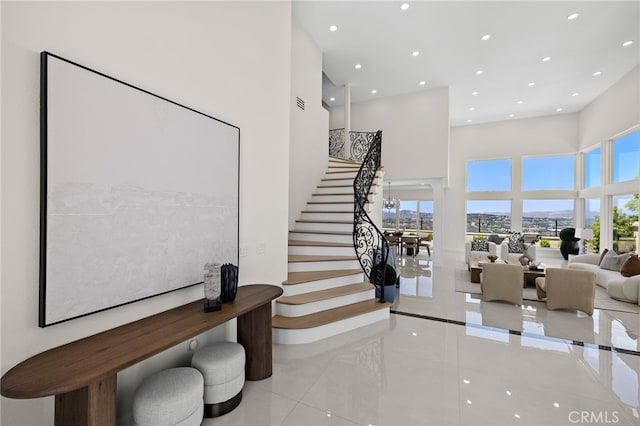 7 Sierra Vis, Laguna Niguel, CA 92677 - stairway with tile patterned floors, a high ceiling, and recessed lighting