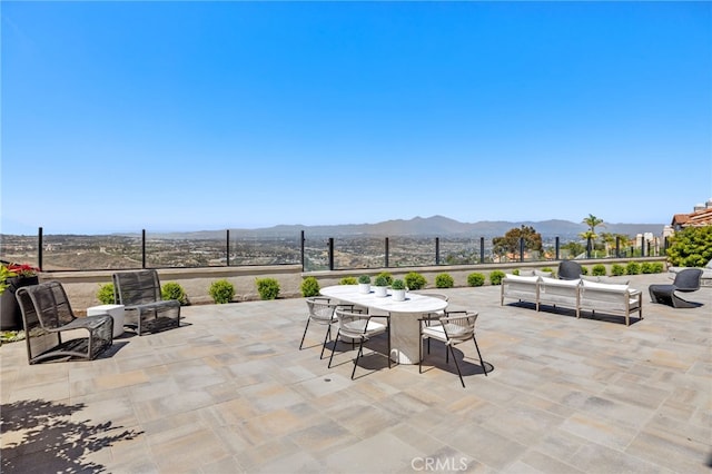 7 Sierra Vis, Laguna Niguel, CA 92677 - view of patio / terrace featuring a mountain view, outdoor dining area, and an outdoor hangout area