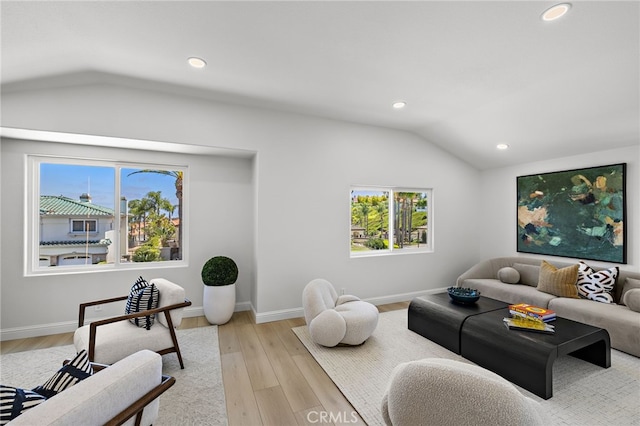 7 Sierra Vis, Laguna Niguel, CA 92677 - living room with vaulted ceiling, recessed lighting, and light wood-type flooring