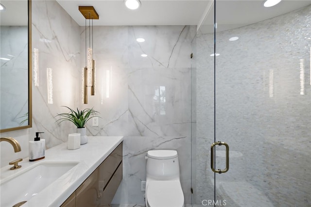 7 Sierra Vis, Laguna Niguel, CA 92677 - bathroom featuring tile walls, a marble finish shower, vanity, and recessed lighting