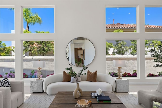 7 Sierra Vis, Laguna Niguel, CA 92677 - living area featuring a high ceiling, healthy amount of natural light, and wood finished floors