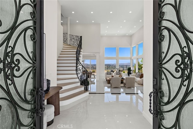 7 Sierra Vis, Laguna Niguel, CA 92677 - foyer entrance with a towering ceiling, recessed lighting, stairway, and tile patterned floors