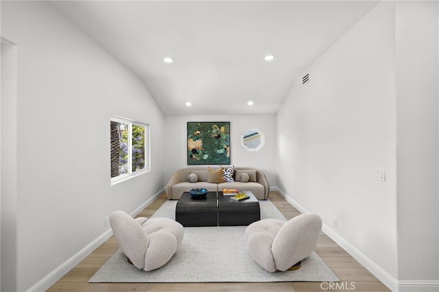 7 Sierra Vis, Laguna Niguel, CA 92677 - living room featuring light wood-style floors, recessed lighting, and vaulted ceiling