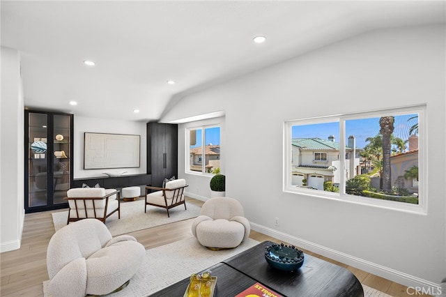 7 Sierra Vis, Laguna Niguel, CA 92677 - living room with vaulted ceiling, light wood-style floors, and recessed lighting