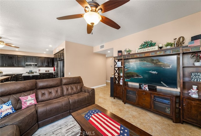 5601 Crestline Pl, Rancho Cucamonga, CA 91739 - living room featuring ceiling fan and light tile patterned floors