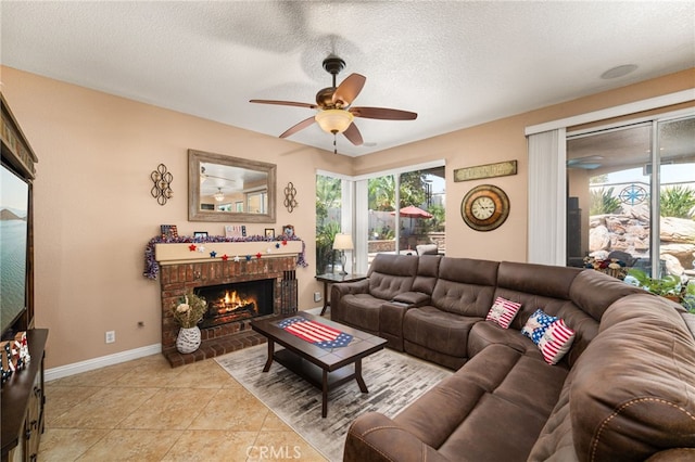 5601 Crestline Pl, Rancho Cucamonga, CA 91739 - living area with ceiling fan, healthy amount of natural light, a brick fireplace, a textured ceiling, and light tile patterned floors