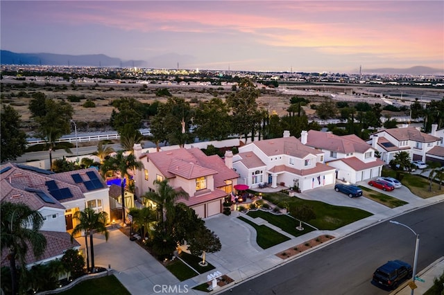 5601 Crestline Pl, Rancho Cucamonga, CA 91739 - aerial view at dusk of a residential view