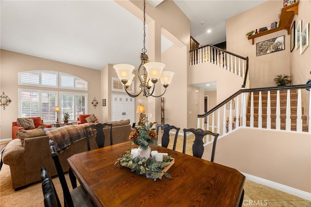 5601 Crestline Pl, Rancho Cucamonga, CA 91739 - dining area with a chandelier, stairway, and a high ceiling