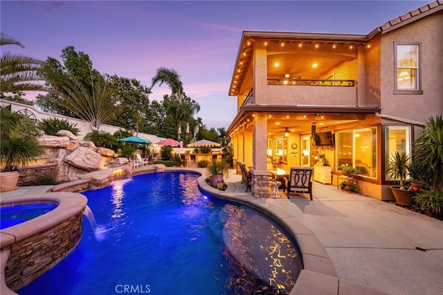 5601 Crestline Pl, Rancho Cucamonga, CA 91739 - view of swimming pool with a patio, a pool with connected hot tub, and a fire pit
