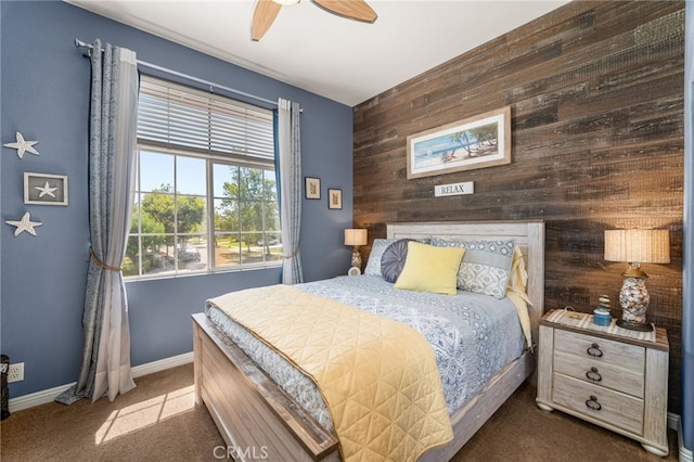 5601 Crestline Pl, Rancho Cucamonga, CA 91739 - carpeted bedroom featuring wooden walls, ceiling fan, and an accent wall