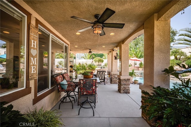 5601 Crestline Pl, Rancho Cucamonga, CA 91739 - view of patio featuring a ceiling fan and outdoor dining space