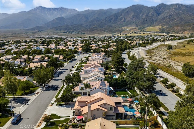 5601 Crestline Pl, Rancho Cucamonga, CA 91739 - aerial perspective of suburban area featuring a mountainous background
