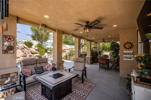 5601 Crestline Pl, Rancho Cucamonga, CA 91739 - view of patio featuring an outdoor living space with a fire pit, a ceiling fan, and outdoor dining space