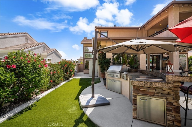 5601 Crestline Pl, Rancho Cucamonga, CA 91739 - fenced backyard featuring area for grilling and a patio area