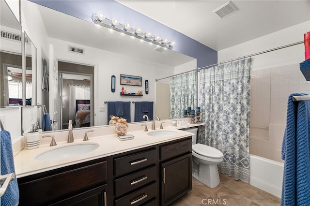 5601 Crestline Pl, Rancho Cucamonga, CA 91739 - ensuite bathroom featuring double vanity, shower / bath combo, and tile patterned flooring