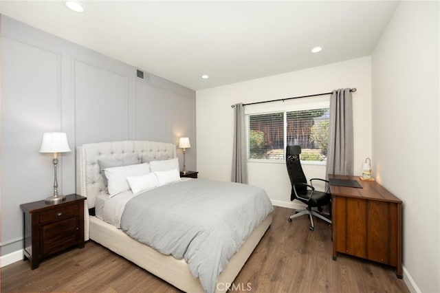 5914 Johnston Pl, Rancho Cucamonga, CA 91739 - bedroom featuring wood finished floors, recessed lighting, and an office area