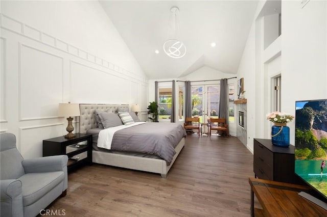 5914 Johnston Pl, Rancho Cucamonga, CA 91739 - bedroom featuring high vaulted ceiling and wood finished floors