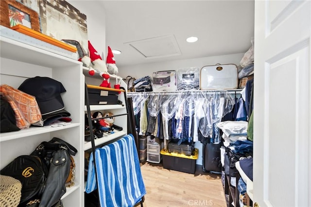 5914 Johnston Pl, Rancho Cucamonga, CA 91739 - walk in closet with attic access and wood finished floors