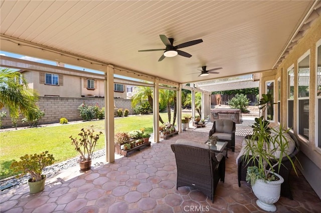 5914 Johnston Pl, Rancho Cucamonga, CA 91739 - fenced backyard with a patio, ceiling fan, and outdoor lounge area