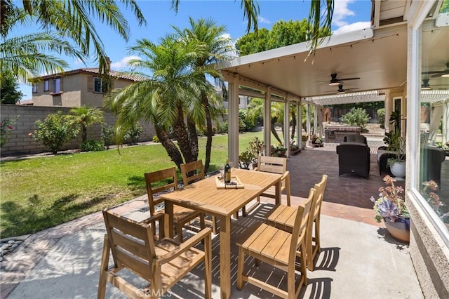 5914 Johnston Pl, Rancho Cucamonga, CA 91739 - fenced backyard with outdoor dining area, a patio, and ceiling fan