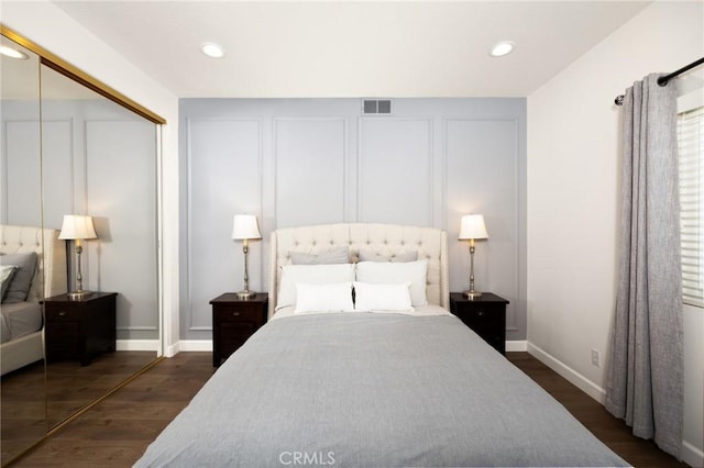 5914 Johnston Pl, Rancho Cucamonga, CA 91739 - bedroom with dark wood finished floors, recessed lighting, and a closet