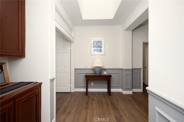5914 Johnston Pl, Rancho Cucamonga, CA 91739 - hallway featuring dark wood-type flooring and a wainscoted wall