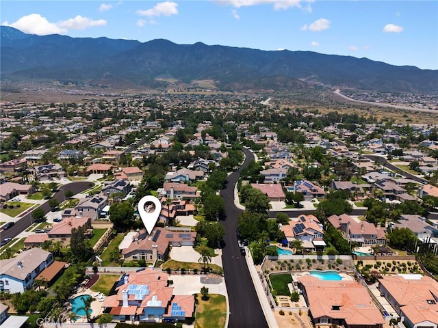 5914 Johnston Pl, Rancho Cucamonga, CA 91739 - aerial view of property and surrounding area featuring a mountainous background and nearby suburban area