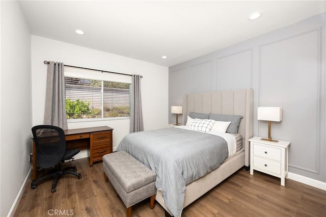 5914 Johnston Pl, Rancho Cucamonga, CA 91739 - bedroom featuring wood finished floors, recessed lighting, and an office area