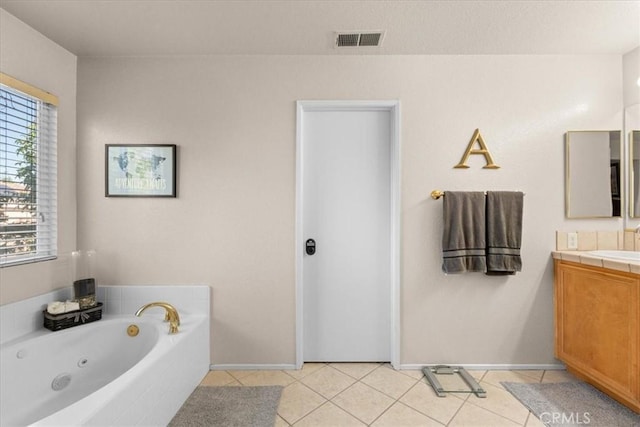 11868 Bunker Hill Dr, Rancho Cucamonga, CA 91730 - full bath featuring vanity, a whirlpool tub, healthy amount of natural light, and tile patterned flooring
