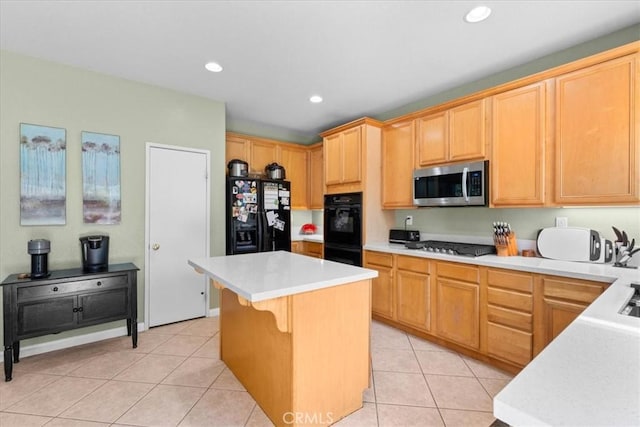 11868 Bunker Hill Dr, Rancho Cucamonga, CA 91730 - kitchen with black appliances, light countertops, a kitchen island, light tile patterned floors, and recessed lighting