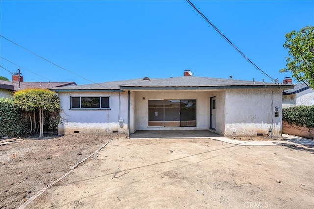 1014 W 185th St, Gardena, CA 90248 - rear view of property with crawl space, a patio, and stucco siding