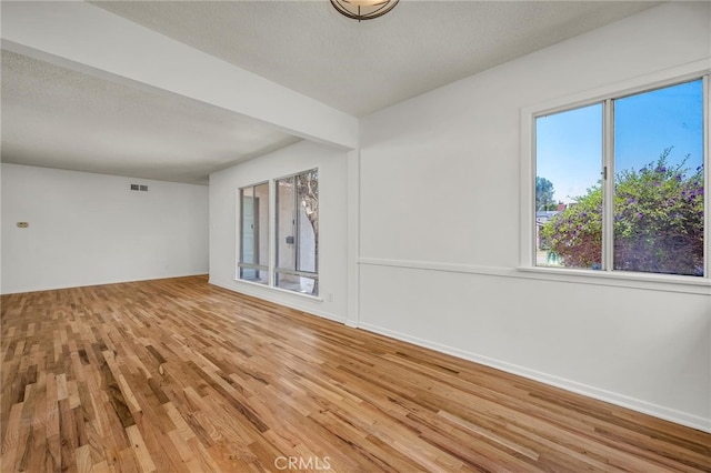 1014 W 185th St, Gardena, CA 90248 - spare room with wood finished floors and a textured ceiling
