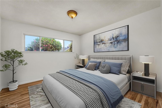 1014 W 185th St, Gardena, CA 90248 - bedroom with wood finished floors and baseboards
