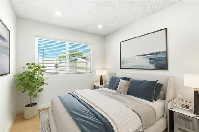 17742 Devonshire St Unit 3, Northridge, CA 91325 - bedroom featuring a textured ceiling and recessed lighting