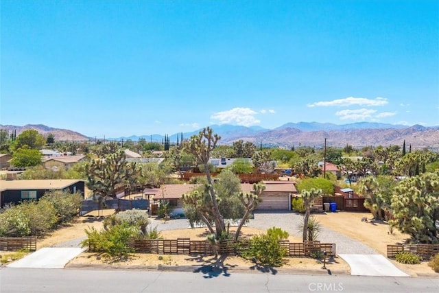 7638 Dumosa Ave, Yucca Valley, CA 92284 - view of mountain background with nearby suburban area