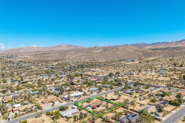 7638 Dumosa Ave, Yucca Valley, CA 92284 - aerial view of residential area with a mountainous background and a desert landscape