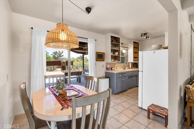 7638 Dumosa Ave, Yucca Valley, CA 92284 - dining area with light tile patterned floors