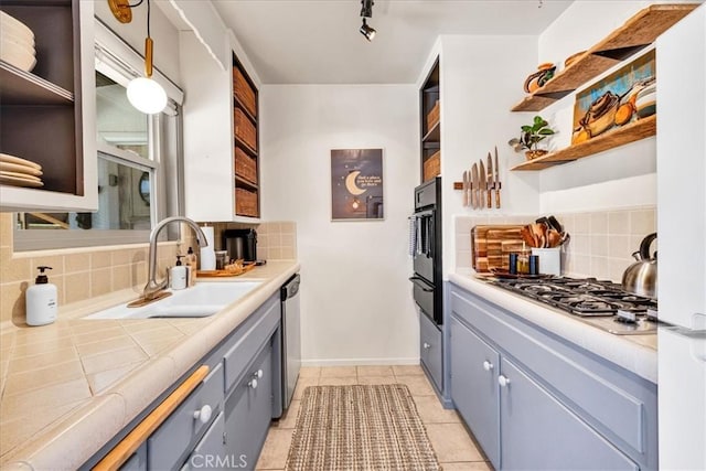 7638 Dumosa Ave, Yucca Valley, CA 92284 - kitchen featuring open shelves, appliances with stainless steel finishes, gray cabinets, tasteful backsplash, and tile countertops