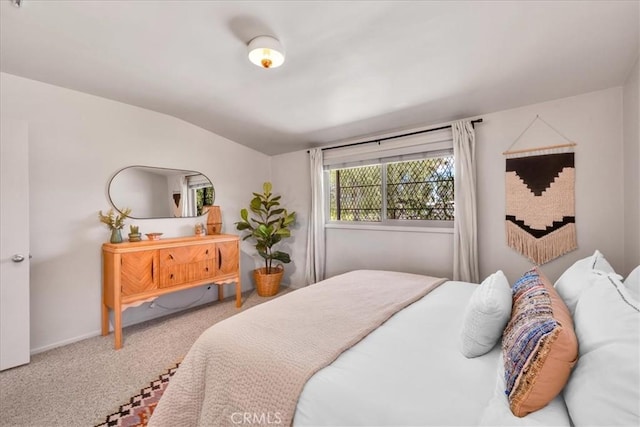 7638 Dumosa Ave, Yucca Valley, CA 92284 - carpeted bedroom with lofted ceiling