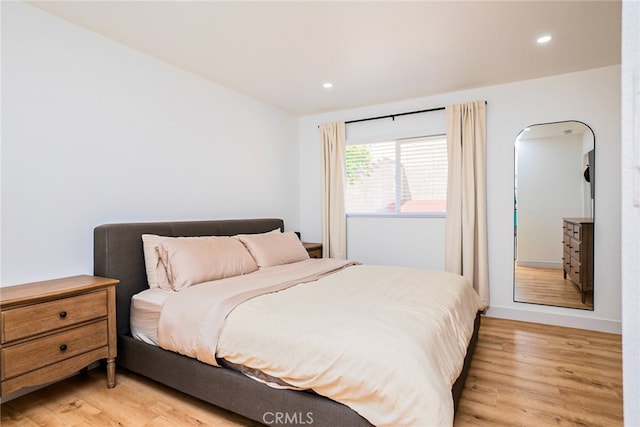 9140 Garden St, Rancho Cucamonga, CA 91701 - bedroom featuring light wood-style flooring and recessed lighting