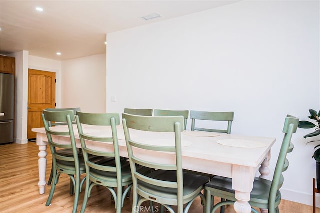 9140 Garden St, Rancho Cucamonga, CA 91701 - dining room featuring light wood-style floors and recessed lighting