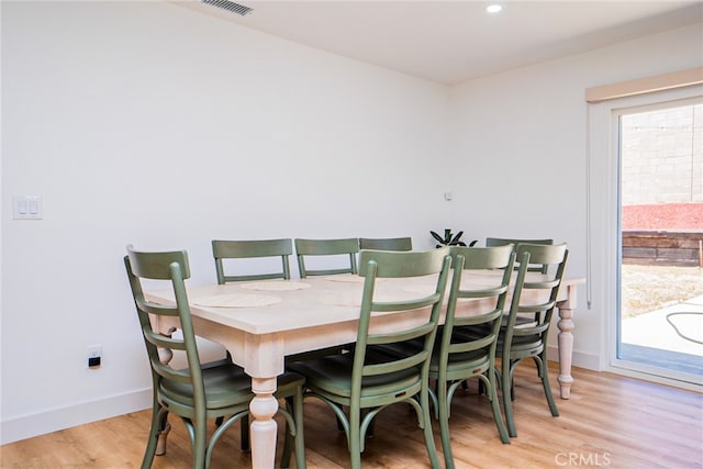 9140 Garden St, Rancho Cucamonga, CA 91701 - dining area featuring light wood-style flooring and baseboards